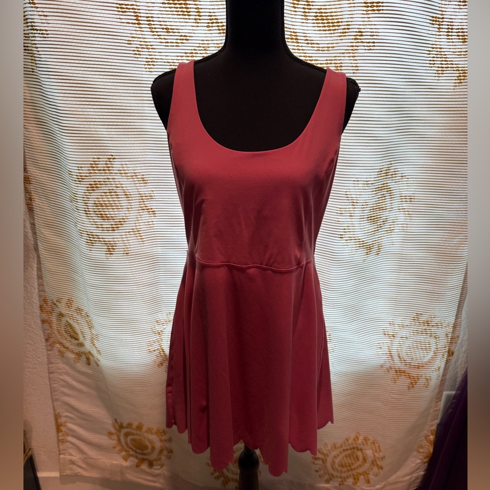 Dress with shorts to go underneath the shorts have pockets.